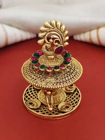 peacock pooja box, gold sindoor holder with stones