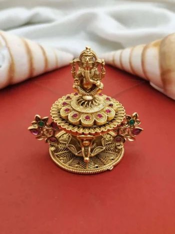 decorative Ganpati sindoor box, gold Ganesha idol
