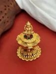 antique Laxmi sindoor box, gold with idol and stones