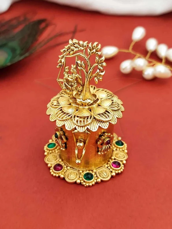 Krishna swing sindoor box, gold tree statue with stones