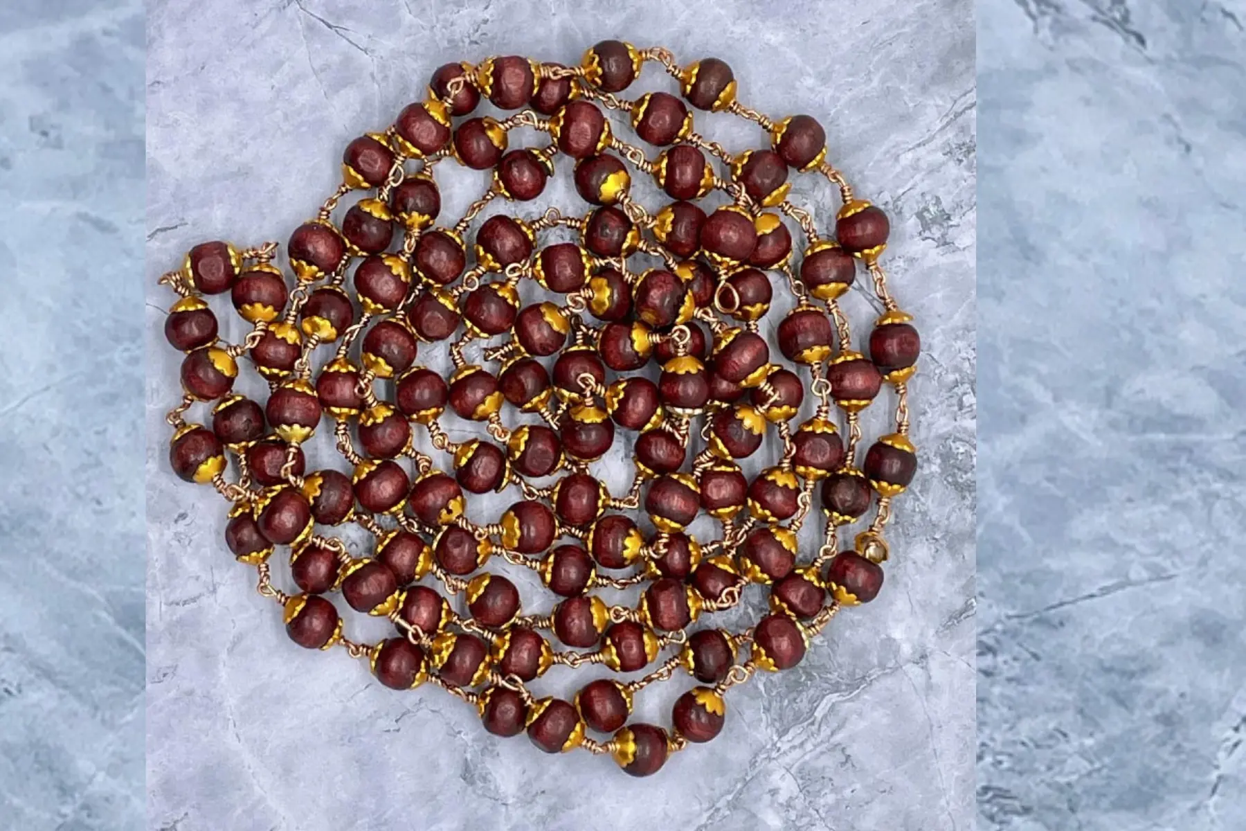 Pumiroots-AyyappanPooja-MALA-TULS-C-B-1 brown tulasi mala with gold cap, 108 tulsi beads