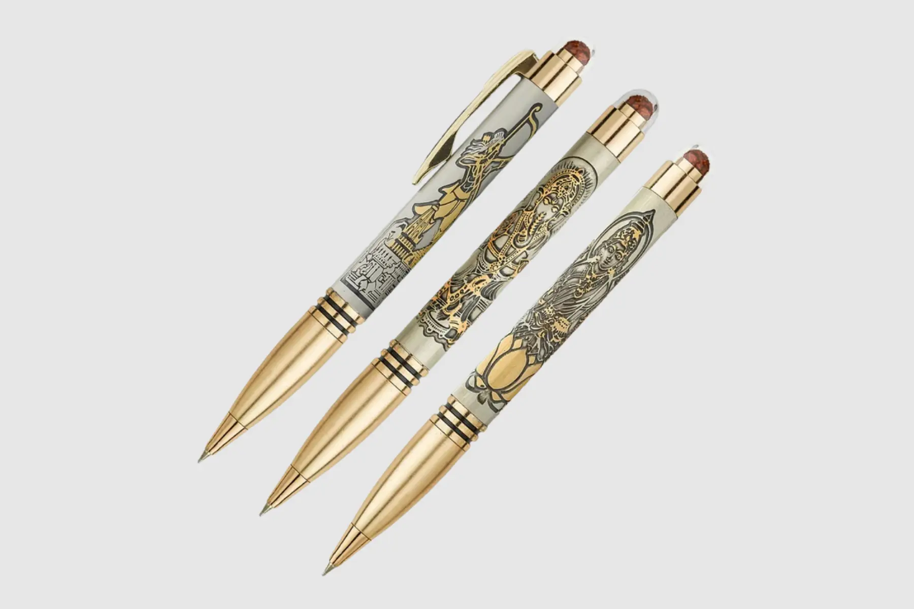Pumiroots-Pen-DEV-RAM-GAN-LAK-1 Divine Rudraksha pen set featuring Laxmi, Ram, and Ganesha pens